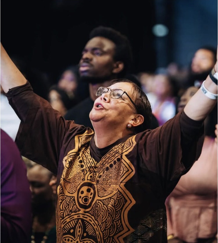 Mother deep in worship